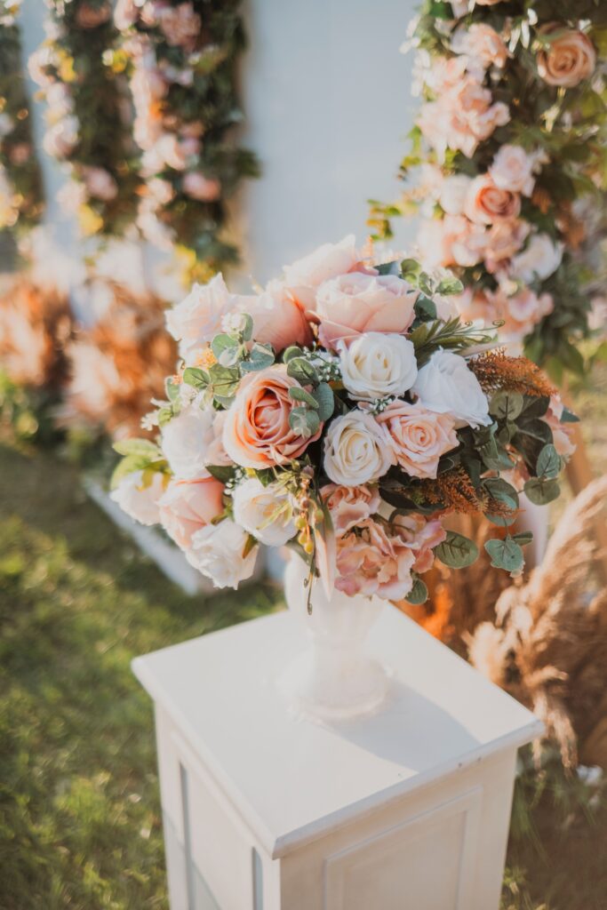 Beautiful bouquet of roses on a stand, perfect for wedding decor. for same-day flower delivery in Kolkata.