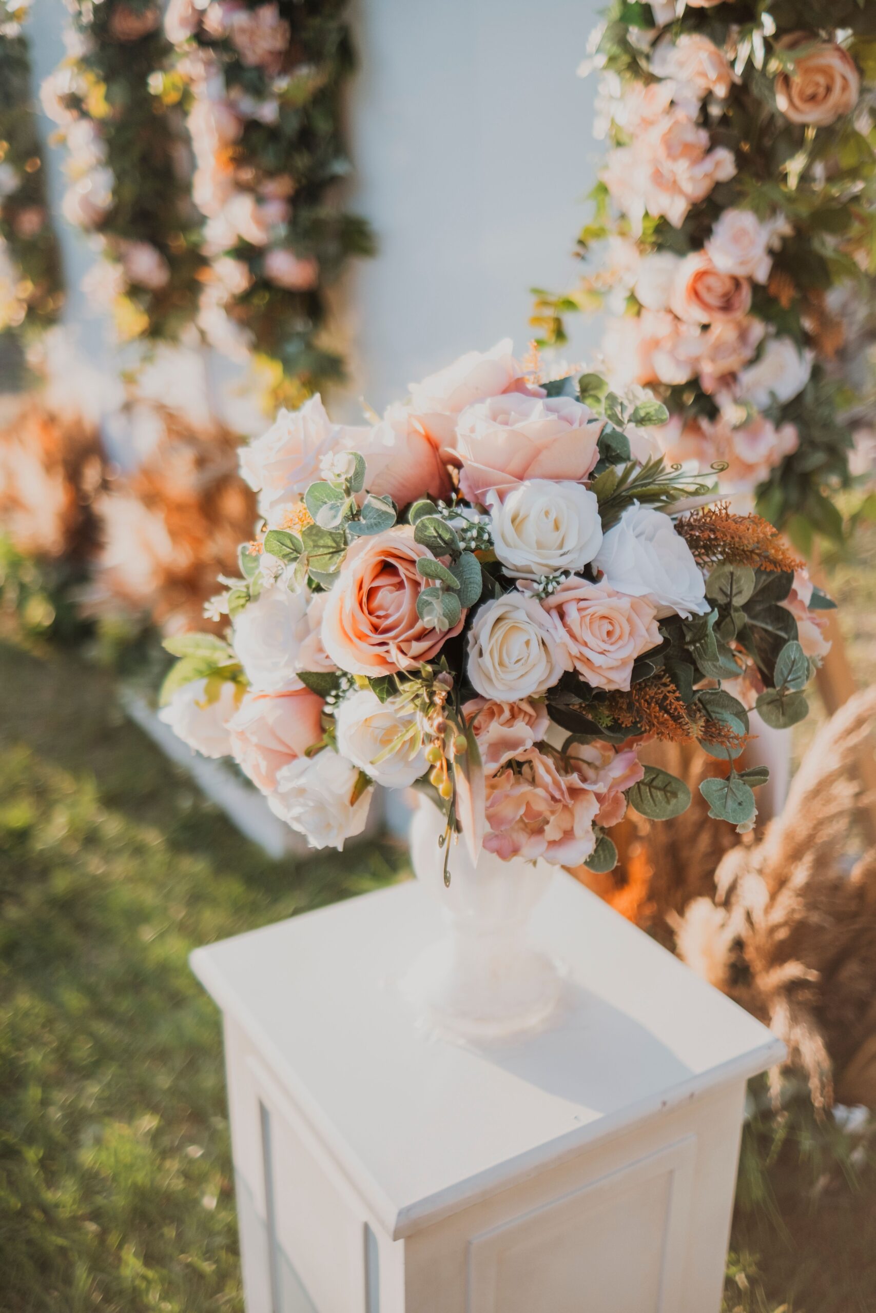 Beautiful bouquet of roses on a stand, perfect for wedding decor. for same-day flower delivery in Kolkata.